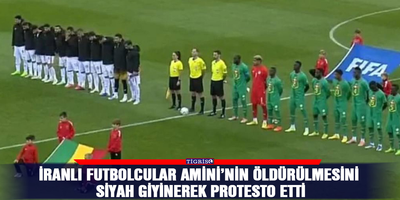 İranlı futbolcular Amini’nin öldürülmesini siyah giyinerek protesto etti