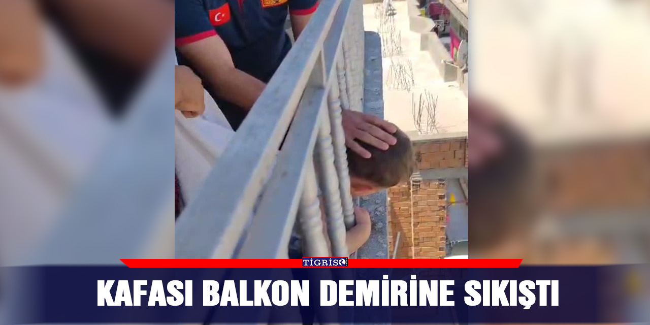 Kafası balkon demirine sıkıştı