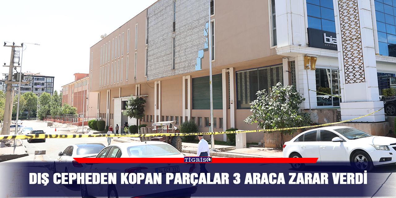 Dış cepheden kopan parçalar 3 araca zarar verdi