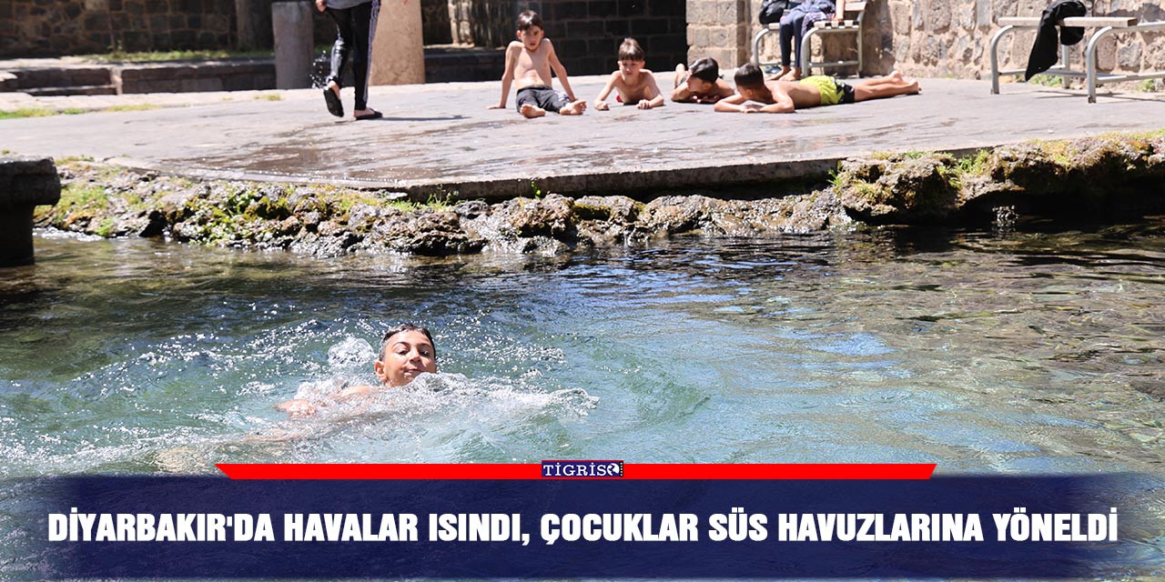 Diyarbakır'da havalar ısındı, çocuklar süs havuzlarına yöneldi