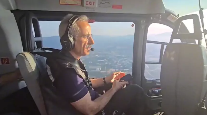 Bakan Uraloğlu, helikopterle yangın bölgesini havadan inceledi