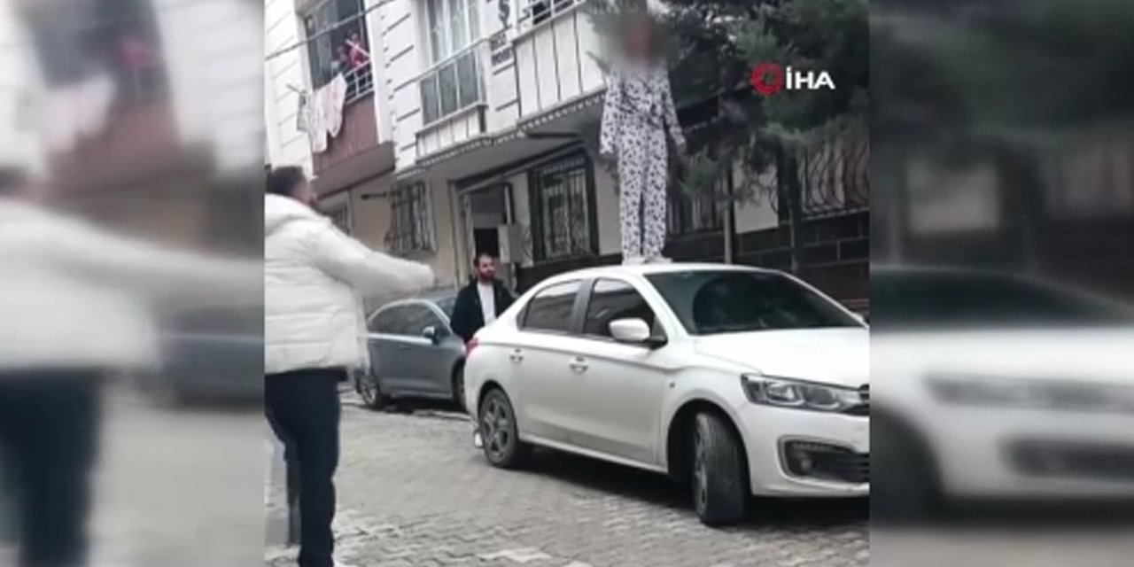 Sinir krizi geçiren kadın otomobilin üzerine çıkarak zıpladı
