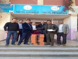 Silvan'da öğrencilere elbise ve ayakkabı yardımı